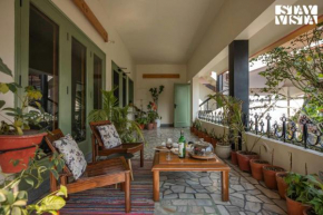 StayVista's Fiddle Leaf Home - Elegant Interiors, Spacious Lawn & Inviting Balcony